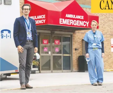  ?? FRANK GUNN / THE CANADIAN PRESS ?? Dr. Jerome Leis and Dr. Lynfa Stroud were at Sunnybrook Hospital in Toronto a year ago, when a patient with what seemed to be mild pneumonia eventually turned out to be “Patient Zero” in the COVID-19 pandemic to come.