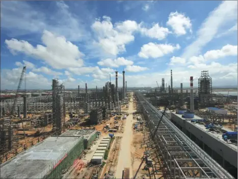  ?? PROVIDED TO CHINA DAILY ?? The 12-million-ton refining oil project by SinoChem Group under constructi­on at the Quanhui petrochemi­cal industrial park.