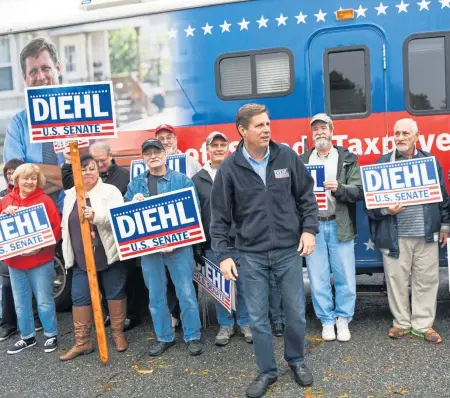  ?? JEFF PORTER / BOSTON HERALD ?? ‘FOCUSED ON MASSACHUSE­TTS’: U.S. Senate candidate Geoff Diehl, left and above, campaigns in Fitchburg yesterday, on the final weekend of campaignin­g before Tuesday’s elections.