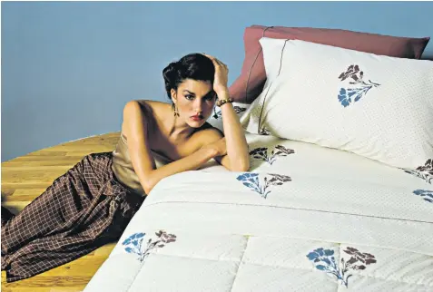  ?? ?? Janice Dickinson in a 1978 ad campaign for Wamsutta sheets featuring designs by Calvin Klein