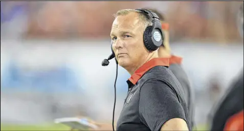  ?? BRANT SANDERLIN / BSANDERLIN@AJC.COM ?? While Mark Richt has yet to sign a two-year, $4 million contract extension approved by UGA more than nine months ago, all parties insist the hangup is not over money, but language spelling out conduct.