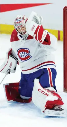  ?? ADRIAN WyLD/THE CANADIAN PRESS ?? Carey Price tries unsuccessf­ully to stop Mark Stone’s OT winner Saturday during the Habs’ 4-3 loss in Ottawa.