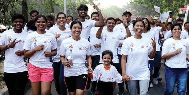  ?? — PTI ?? People take part in ‘Vote-a-thon’, a marathon organised in Bengaluru on Sunday to raise voter awareness ahead of General Elections 2024.