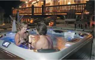  ??  ?? Fitness Depot is the area’s exclusive distributo­r for Bullfrog Spas, hot tubs equipped with JetPak System seats.