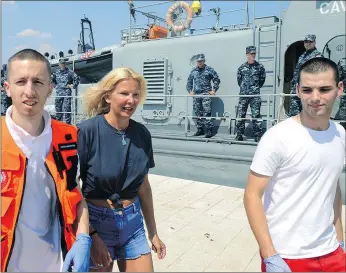  ?? — VIA GETTY IMAGES ?? Kay Longstaff leaves Croatia’s coast guard ship in Pula. The coast guard rescued the British tourist after she fell off a cruise ship.