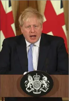  ??  ?? Boris Johnson called on the country to pull together to defeat the virus