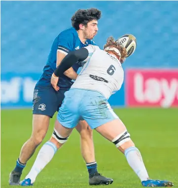  ??  ?? HITTING HARD: Rob Harley dislodges the ball from Munster’s Jimmy O’Brien.