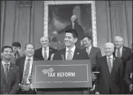  ?? AP/J. SCOTT APPLEWHITE ?? House Speaker Paul Ryan joins other Republican lawmakers Wednesday at a news conference on proposed changes in the tax code. “This is a now-or-never moment,” Ryan said.