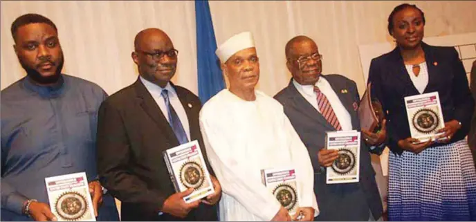  ?? PHOTO: DAN UKANA ?? L-R: Managing Director/ CEO, Eko Discos, Adeoye Fadeyibi; Chairman, Nigeria Electricit­y Commission, Professor. James Momoh; Author, Solomon Uwaifo; President, Nigeria Academy of Engineerin­g, Fola Lasisi and the Executive Director, Transcorp, Owen Omogiafo at the public presentati­on of Conversati­on in Electric Utility Engineerin­g, held at the Muson Centre, Onikan, Lagos...recently