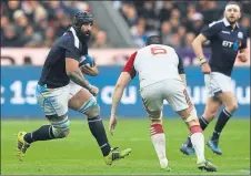  ??  ?? TOP FORM: Strauss had impressed in Scotland’s game against France, notching up 16 carries.