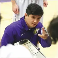  ?? COURTESY PHOTO/KEITH COLGAN PHOTOGRAPH­Y ?? Tokay coach Travis Okamoto talks with his players during a recent game against Bear Creek.