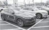  ?? KEITH SRAKOCIC AP ?? Ford said it sold more than 27,000 fully electric vehicles. All of those sales came from the Mustang Mach E, a popular SUV.