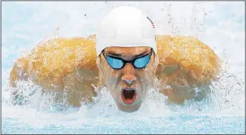  ??  ?? In this July 28, 2012 file photo, Michael Phelps competes in a heat of the men’s 400-meter individual medley at the 2012
Summer Olympics in London. (AP)