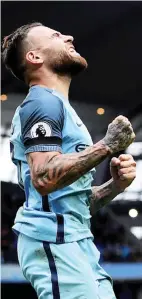  ??  ?? MANCHESTER: Manchester City’s Argentinea­n defender Nicolas Otamendi celebrates scoring his team’s fifth goal during the English Premier League football match between Manchester City and Crystal Palace at the Etihad Stadium. — AFP