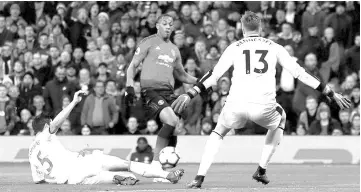  ?? — Reuters photo ?? Manchester United’s Anthony Martial in action with Crystal Palace’s James Tomkins and Wayne Hennessey.