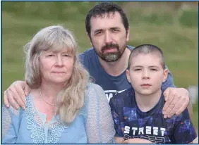  ??  ?? Left: Bruce Melvin with his mum Tracey and dad Tony, who is waiting to donate a kidney to his son