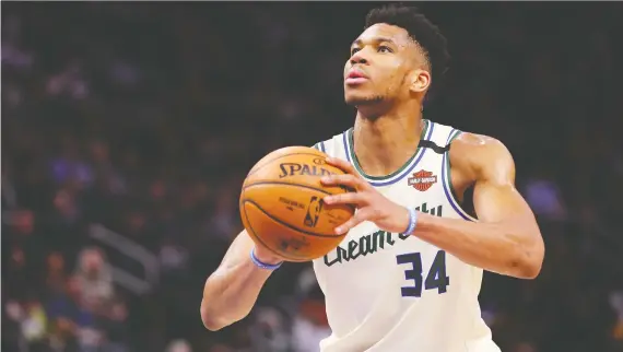  ?? GREGORY SHAMUS/GETTY IMAGES ?? Giannis Antetokoun­mpo and the Bucks are rolling over opponents this season and threatenin­g to become just the third club ever to win 70 games.