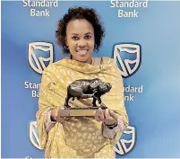  ?? SUPPLIED ?? EAST Coast Radio managing director Boni Mchunu receiving the Community and Social Responsibi­lity award at the Standard Bank KZN Top Business Awards.