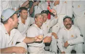  ?? ?? Living the dream: Shane Warne celebratin­g with his team mates after yet another win for Australia during the 1990s; with Liz Hurley, inset below left in 2011