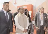  ??  ?? Former cricket team captain M.S. Dhoni (from left) along with Chief Minister Raghubar Das and Ratan Tata at the Momentum Jharkhand investors summit in Ranchi on Thursday.