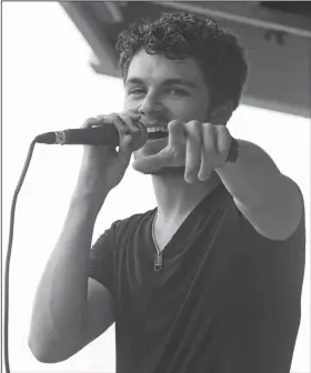  ?? Photos by Terrance Armstard/News-Times ?? Singing: Cory Jackson performs during the 2018 SouthArk Outdoor Expo.