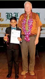  ??  ?? Enesh Fernando was awarded the prize for the All Island Best Junior Vocal Performanc­e at the British Lanka Festival for the Performing Arts that was held recently. Enesh, who is a student of St. Joseph’s College Colombo, is a pupil of Chamalie Rajakaruna.