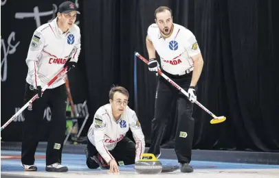  ?? CHEYENNE BOONE, WCF ?? Canadian skip Owen Purcell releases a rock as lead Scott Weagle, left, and second Adam Mceachren prepare to sweep at the world junior curling championsh­ips in Jonkoping, Sweden. The Canadian rink advanced to Saturday's semifinal against Germany.
