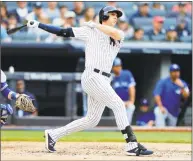  ?? Noah Murray / Associated Press ?? Greg Bird of the Yankees hits a grand slam in the first inning of Sunday’s game against the Blue Jays in New York.