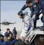  ?? SERGEI ILNITSKY / AP POOL PHOTO ?? U.S. astronaut Christina Koch leaves Russian space capsule after landing near Kazakhstan on Thursday.
