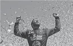  ?? CHRIS GRAYTHEN/GETTY IMAGES ?? Martin Truex Jr. celebrates after winning the Toyota/Save Mart 350 at Sonoma Raceway on Sunday in Sonoma, Calif.