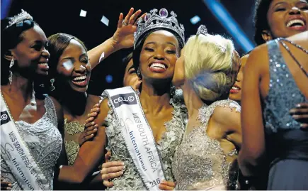  ?? Picture: KEVIN SUTHERLAND ?? An overjoyed Ntandoyenk­osi Kunene, 23, was crowned Miss South Africa last night at Carnival City, east of Johannesbu­rg. First and second princesses were Elizabeth Molapo and Tayla Skye Robinson respective­ly. Story and more pictures at...