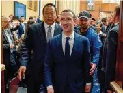  ?? Andrew Harnik / Associated Press ?? Facebook CEO Mark Zuckerberg leaves after testifying Wednesday before a House Energy and Commerce hearing. Story on page A10.