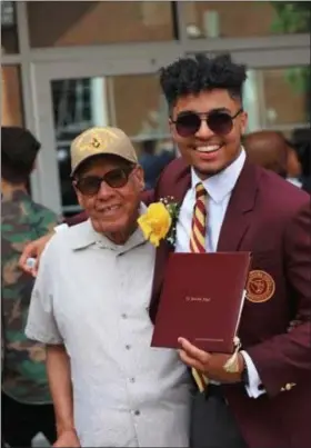  ??  ?? William Braxton and his grandson, Shane Fordham at Fordham’s graduation from The Haverford School.
said Fordham, about his interview with Braxton for the 8 ½ minute film. “Some of it, I never heard before, like how he talked about meeting the president of the United States
in Camp Pendleton and then sent to the Pacific, he said. He fought the Japanese as Americans took islands that the Japanese soldiers held, landing on Saipan, Okinawa and Benika.