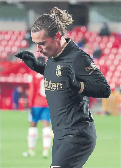  ?? FOTO: GETTY ?? Griezmann, celebrando uno de los goles al Granada con su baile caracterís­tico. Completó un partido con un doblete y una asistencia