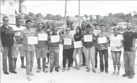  ??  ?? The successful participan­ts of the Coaching Theory Course of the Caribbean Coaches Certificat­ion Programme pose with Vice President of the GOA, Dr. Karen Pilgrim (extreme left) and course conductor,