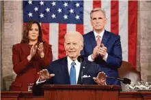  ?? Jacquelyn Martin/Getty Images ?? President Biden delivers the State of the Union address to a joint session of Congress as Vice President Kamala Harris and House Speaker Kevin McCarthy listen Tuesday in Washington.