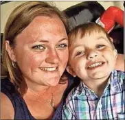  ?? Contribute­d photo ?? Polk County Police Det. Kristen Hearne and her son Isaac.