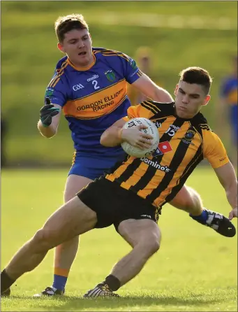  ??  ?? Donal Lenihan of St Peter’s Dunboyne in action against Iarla Hughes of Summerhill.