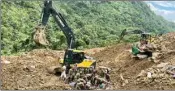  ?? PTI ?? Rescue operations underway after a massive landslide hit the Tupul railway constructi­on camp, in Noney district of Manipur