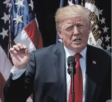  ?? WIN MCNAMEE
GETTY IMAGES ?? U.S. President Donald Trump delivers remarks during a “Celebratio­n of America” event on the south lawn of the White House on Thursday.