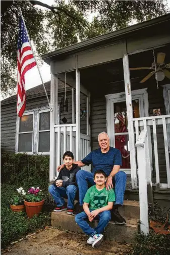  ?? Photos by Marie D. De Jesús / Staff photograph­er ?? Michael Chmiel says he’s proud of what his sons, Isaac, 13, and Francisco, 9, have overcome.