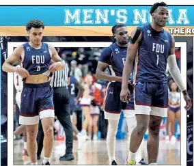  ?? Getty Images ?? OVER AND OUT: FDU senior guard Grant Singleton (left to right), Heru Bligen and Joe Munden Jr. walk toward the bench during the second half.