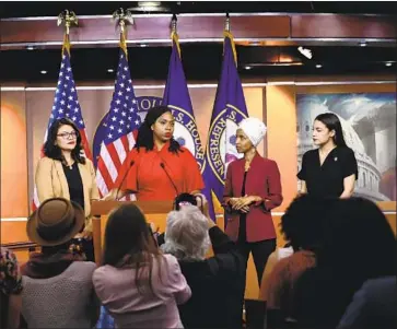  ?? Brendan Smialowski AFP/Getty Images ?? THE “SQUAD,” composed of Democratic U.S. Reps. Rashida Tlaib, left, Ayanna Pressley, Ilhan Omar and Alexandria Ocasio-Cortez, held a news conference last week to respond to the president’s attacks.