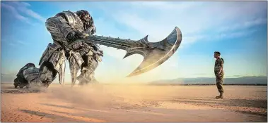  ?? PARAMOUNT PICTURES/BAY FILMS VIA AP ?? Josh Duhamel faces off against Megatron in “Transforme­rs: The Last Knight.”