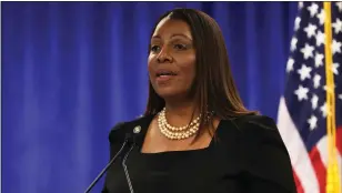  ?? MICHAEL M. SANTIAGO GETTY IMAGES ?? Attorney General Letitia James speaks during a press conference following a verdict against former President Donald Trump in a civil fraud trial on Feb. 16in New York City.