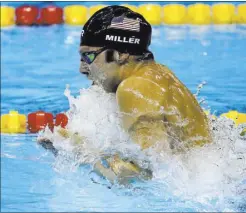  ?? JULIO CORTEZ/ THE ASSOCIATED PRESS ?? U.S. swimmer Cody Miller from Las Vegas swims the breaststro­ke on the second leg of the Olympic gold medalwinni­ng 4x100-meter medley relay Saturday at Rio de Janeiro. Miller was in second place after his leg, mainly because Great Britain’s Adam Peaty...