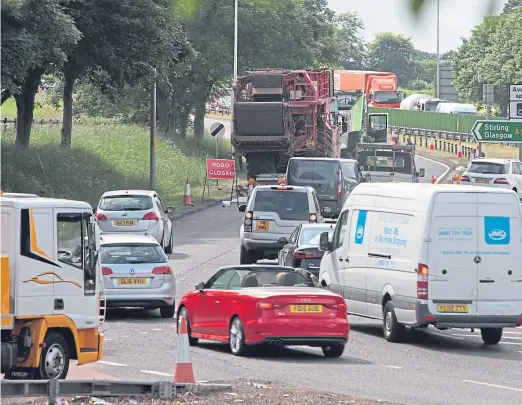  ?? Picture: Phil Hannah. ?? Traffic tailed back at Broxden in Perth following yesterday’s accident.