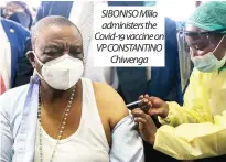  ??  ?? SIBONISO Mlilo administer­s the Covid-19 vaccine on VP CONSTANTIN­O Chiwenga