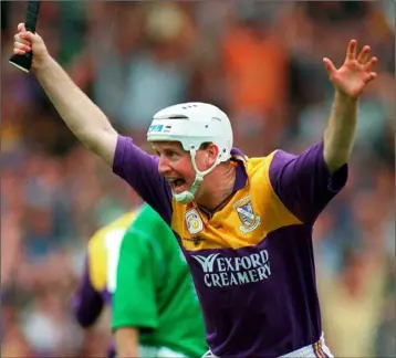  ??  ?? Tom Dempsey celebratin­g his never-to-be-forgotten goal in the 1996 All-Ireland Senior hurling final.