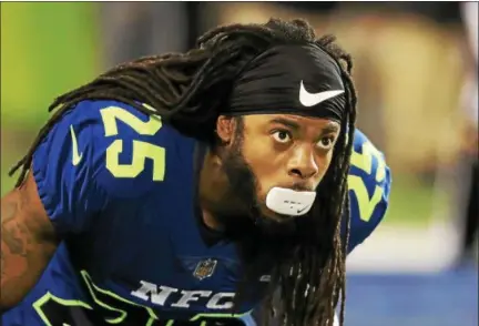  ?? PHOTO BY SAM GREENWOOD — GETTY IMAGES ?? Richard Sherman #25of the NFC warms up prior to the NFL Pro Bowl at the Orlando Citrus Bowl on in Orlando, Florida.